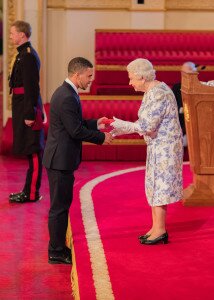 Dillon Ollivierre receives his award from the Queen. 